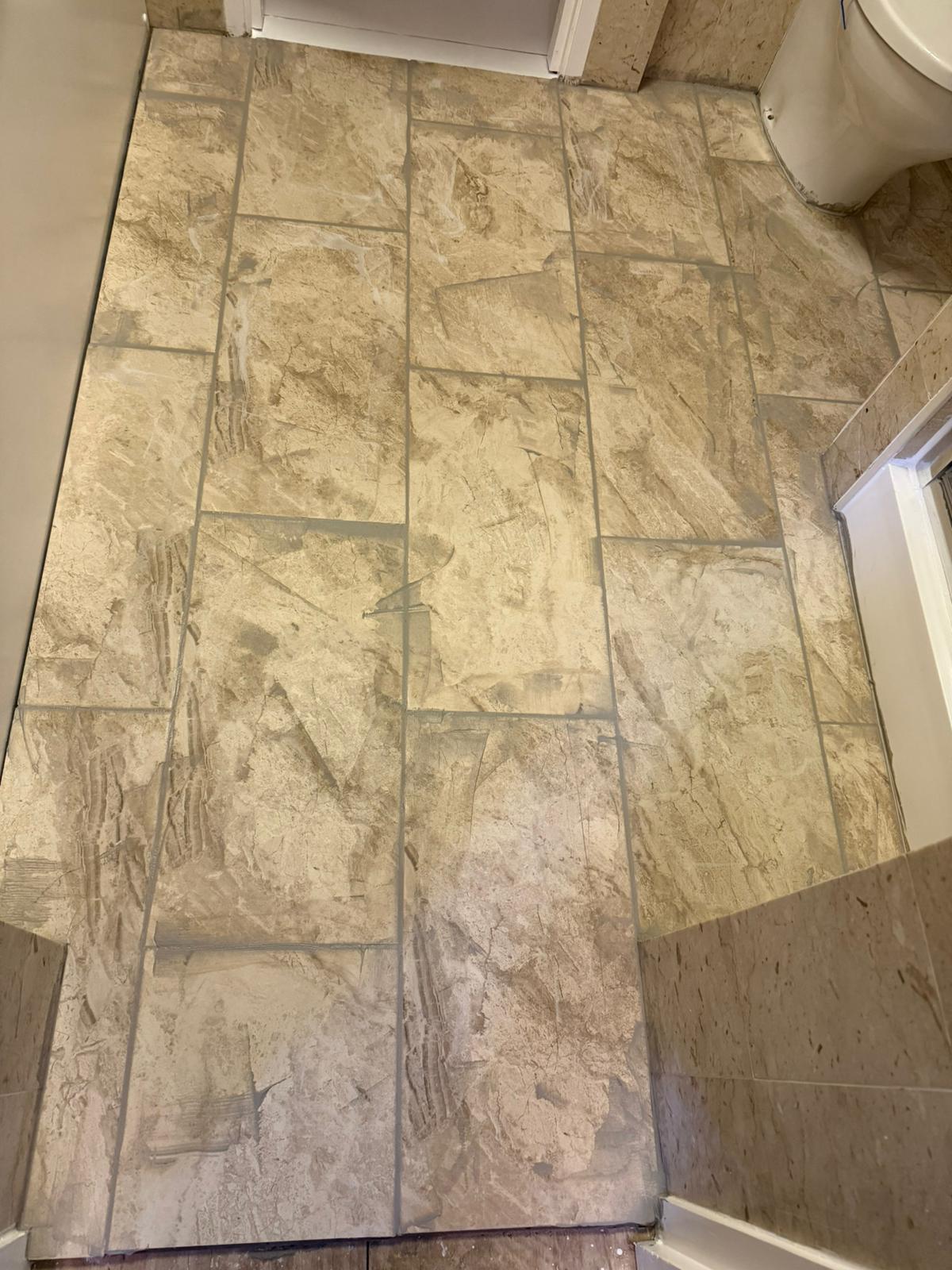 Finished bathroom floor tiles after grouting