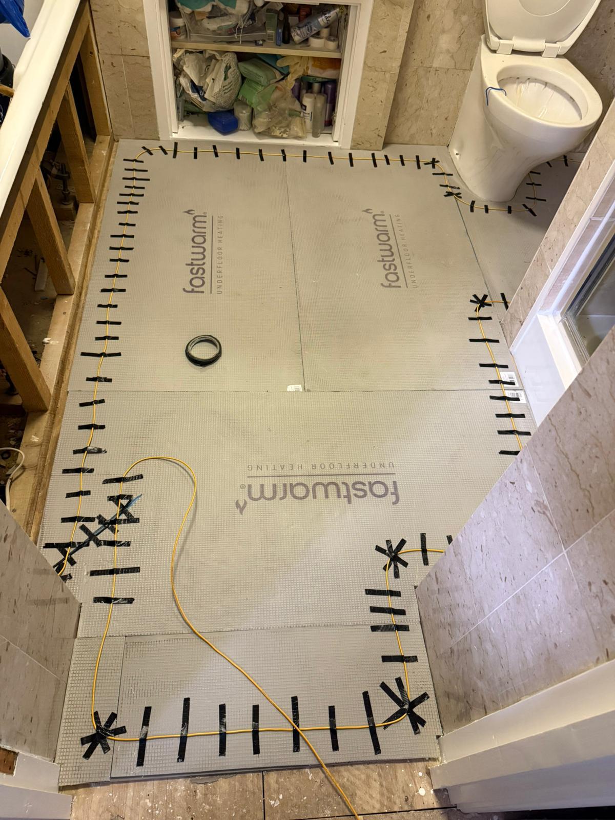 Bathroom floor renovation before completion