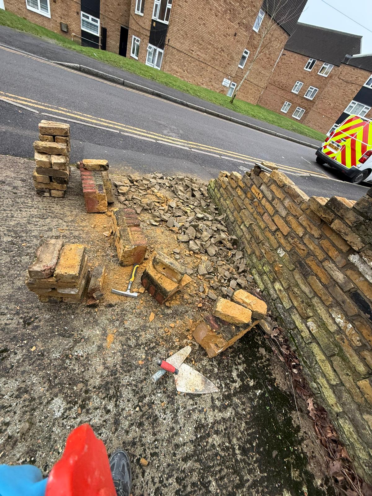 Brick wall repair before completion