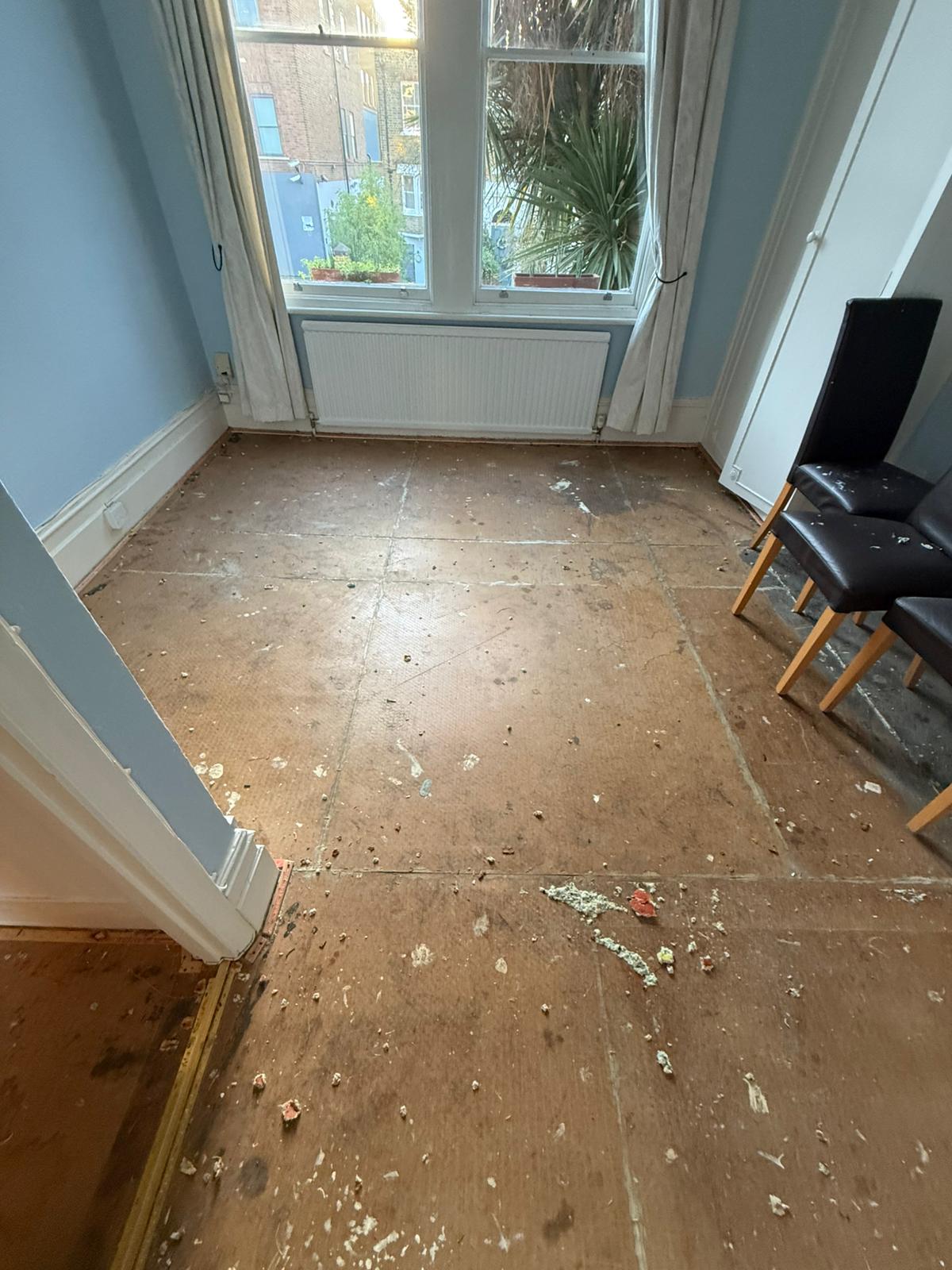 Subfloor cleared and prepared after removing the old flooring